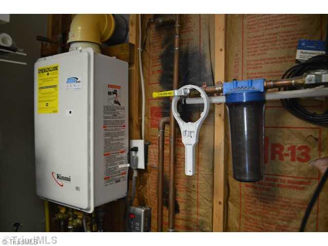 5415 Cook Collier Road Liberty, NC 27298 - Photo 11 of 16 Exterior Front. On-Demand Hot Water Heater
