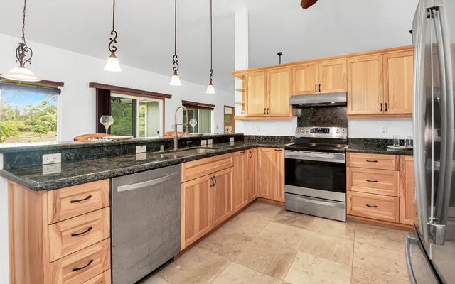 a bedroom with a bed and a potted plant