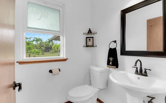a utility room with washing machine and washing machine