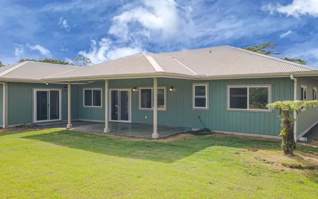 a outdoor space with patio the couches and pool table with chairs