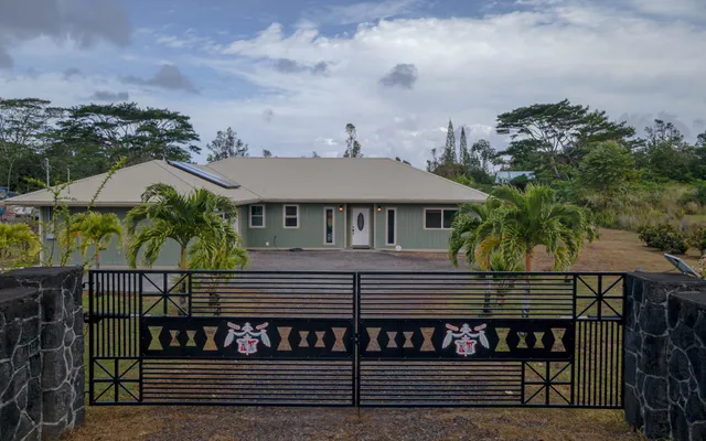 a view of a house with a garden