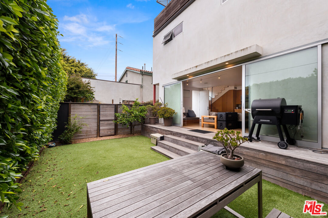 705 Sunset Avenue Venice, CA 90291 - Photo 5 of 32 a view of a lounge chairs in back yard of the house