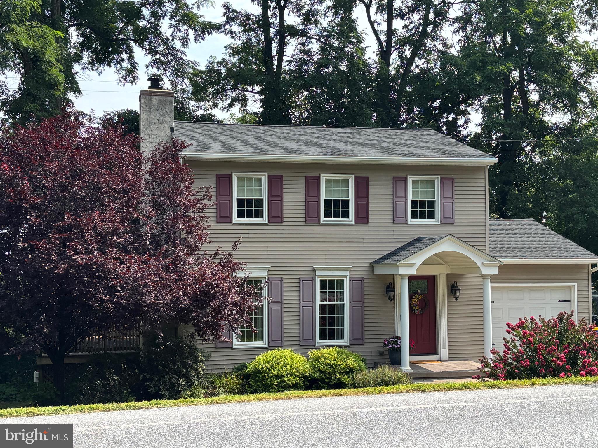 5331 Strasburg Road Kinzers, PA 17535 - Photo 1 of 31 a front view of a house with garden