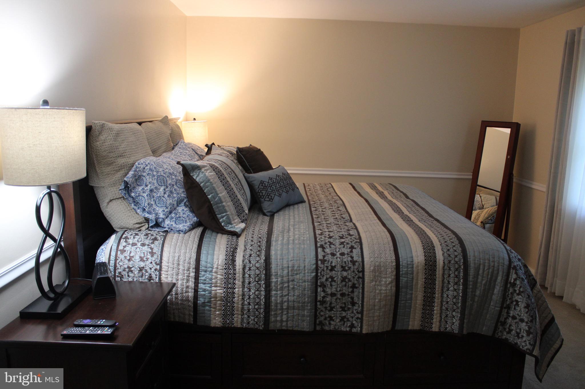 5331 Strasburg Road Kinzers, PA 17535 - Photo 11 of 31 a bedroom with a bed with wooden floor