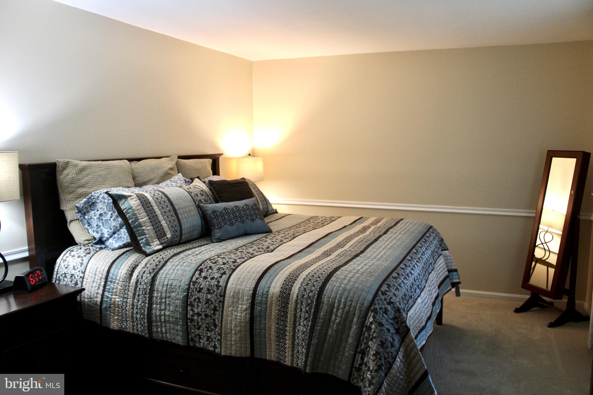 5331 Strasburg Road Kinzers, PA 17535 - Photo 12 of 31 a bed sitting in a bedroom next to a window