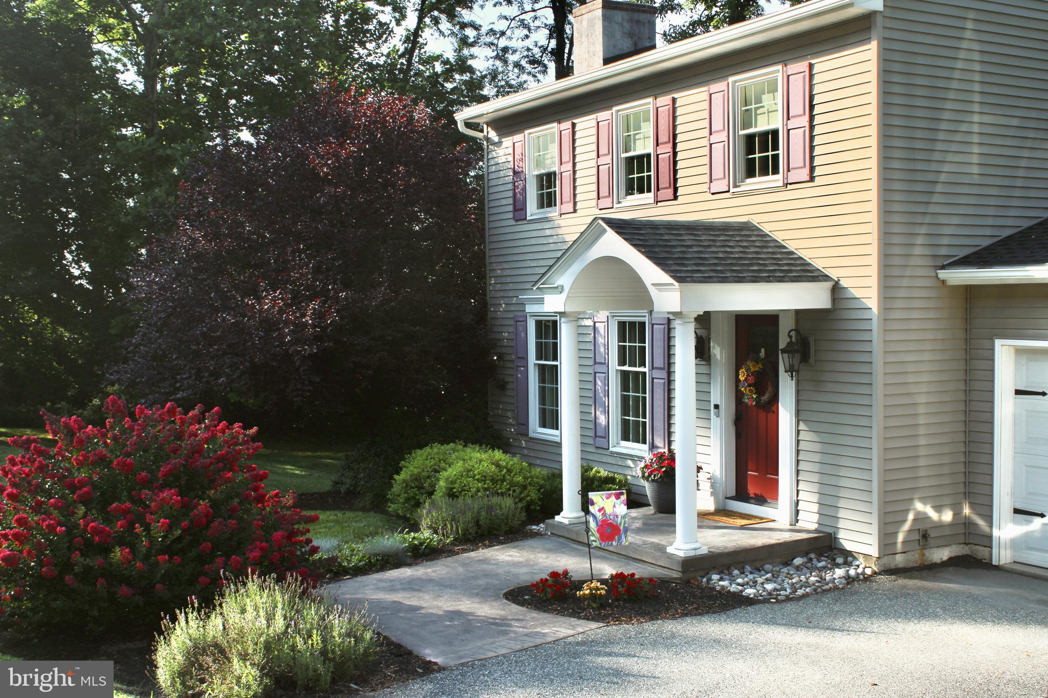 5331 Strasburg Road Kinzers, PA 17535 - Photo 26 of 31 a front view of a house with a garden