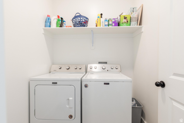 349 West 3085 South Logan, UT 84321 - Photo 20 of 37 Dedicated laundry area with a white top-load washing machine and front-load dryer