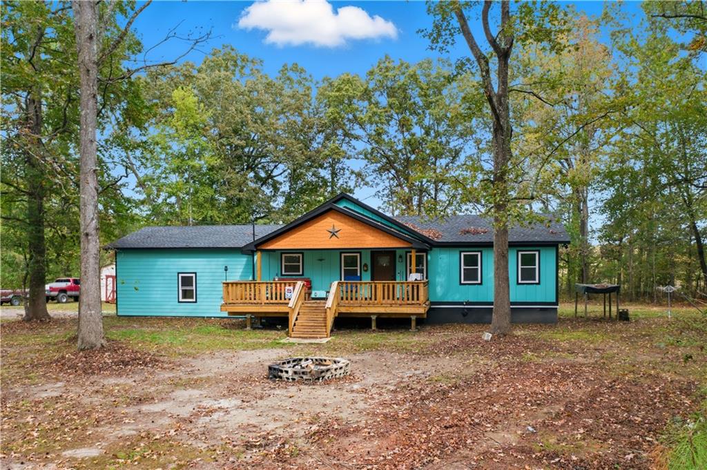 565 Raiford Road Cedartown, GA 30125 - Photo 1 of 37 a house view with a garden space