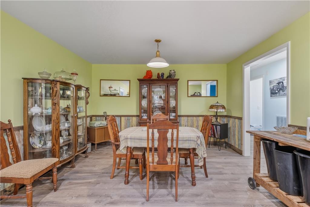565 Raiford Road Cedartown, GA 30125 - Photo 14 of 37 a view of a dining room with furniture window and wooden floor