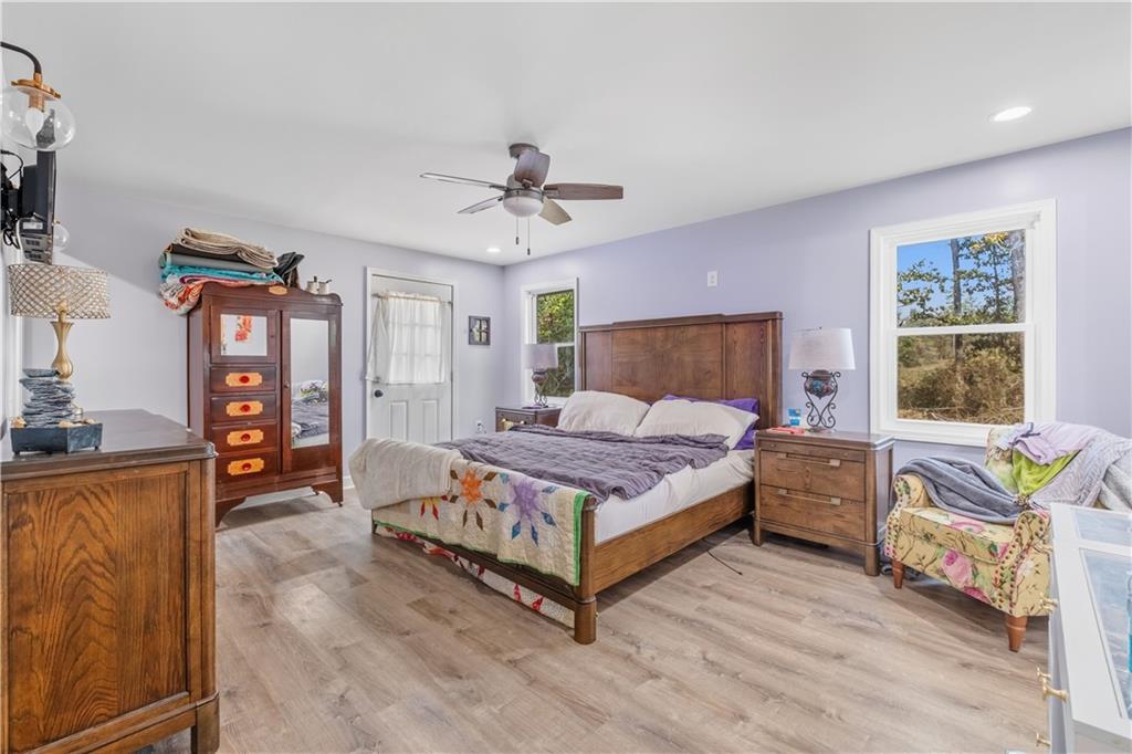 565 Raiford Road Cedartown, GA 30125 - Photo 24 of 37 a bedroom with a bed couch and a window