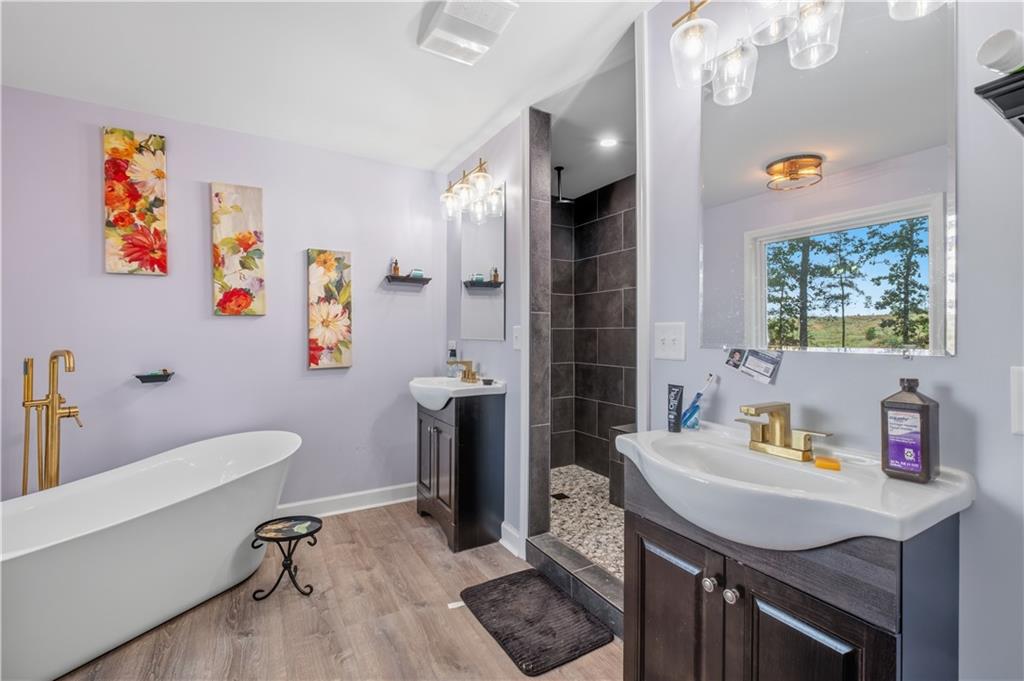 565 Raiford Road Cedartown, GA 30125 - Photo 28 of 37 a bathroom with a sink and a mirror