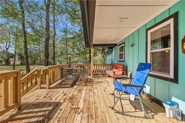 a view of a chairs on the deck