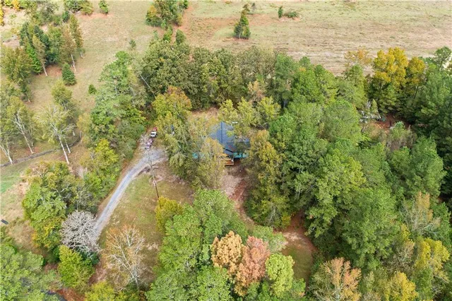 a view of a lake with a yard