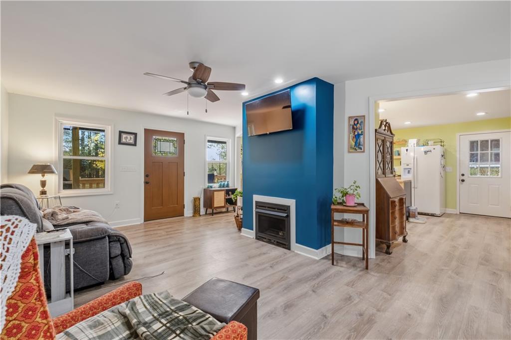 565 Raiford Road Cedartown, GA 30125 - Photo 10 of 37 a living room with furniture and a fireplace