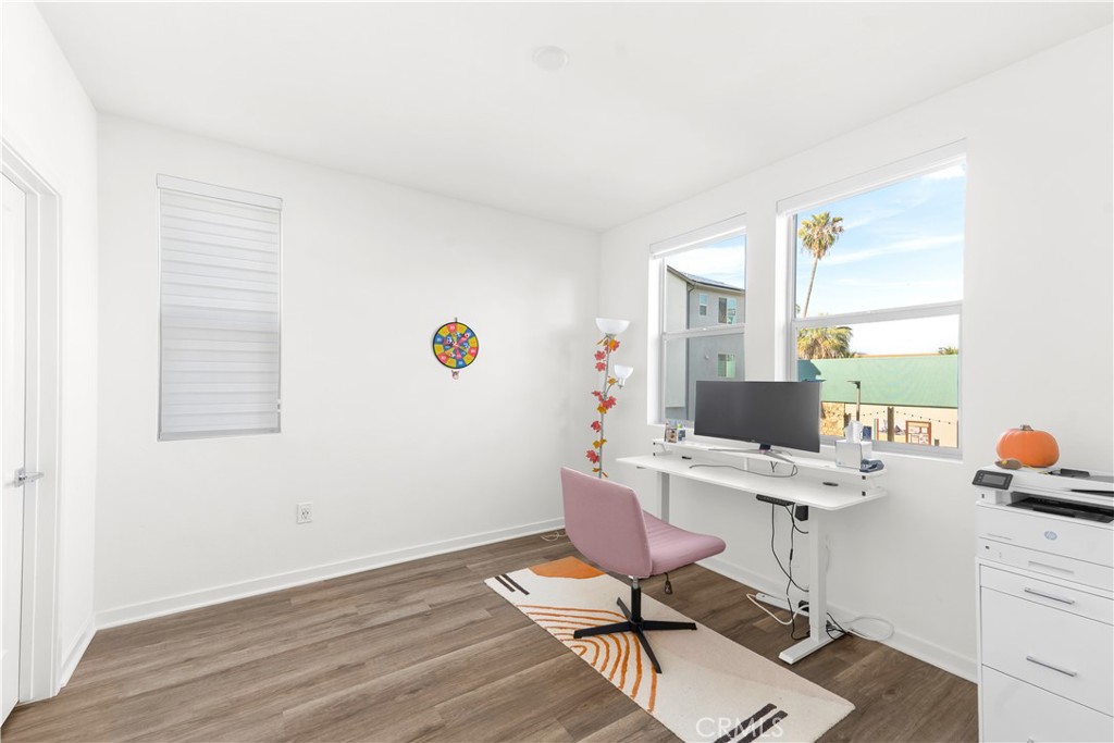 305 Strike Drive Covina, CA 91722 - Photo 13 of 24 a workspace with furniture and wooden floor