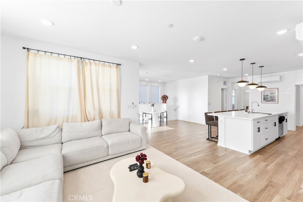 305 Strike Drive Covina, CA 91722 - Photo 3 of 24 a living room with furniture and a large window