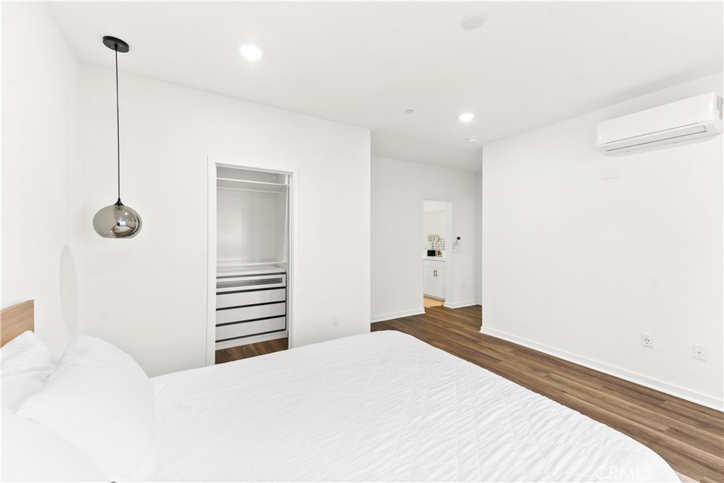 305 Strike Drive Covina, CA 91722 - Photo 9 of 24 a bedroom with a bed and cabinets