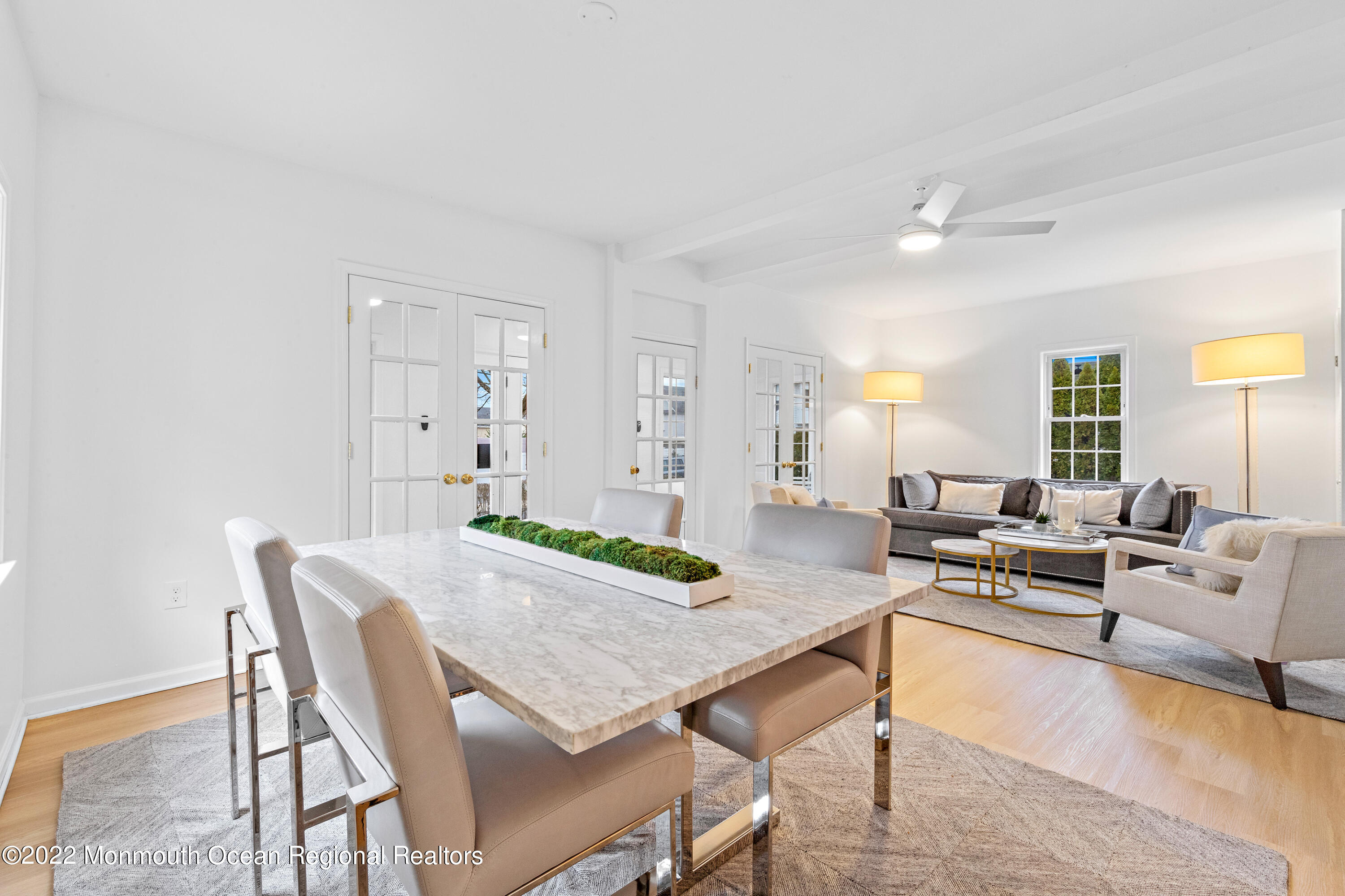 29 Church Street Rumson, NJ 07760 - Photo 12 of 42 a living room with furniture and a table
