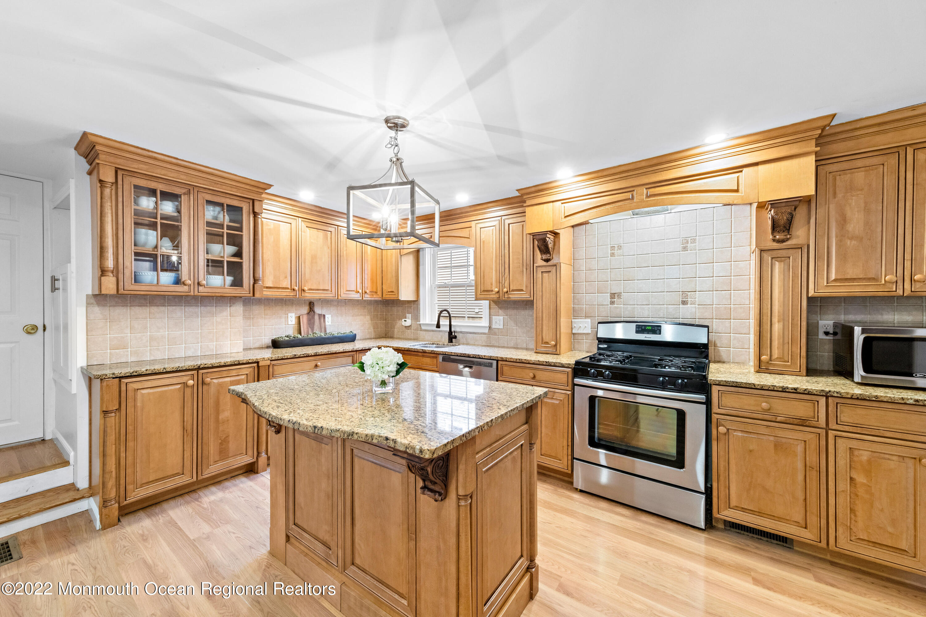 29 Church Street Rumson, NJ 07760 - Photo 14 of 42 a kitchen with a sink stove and microwave