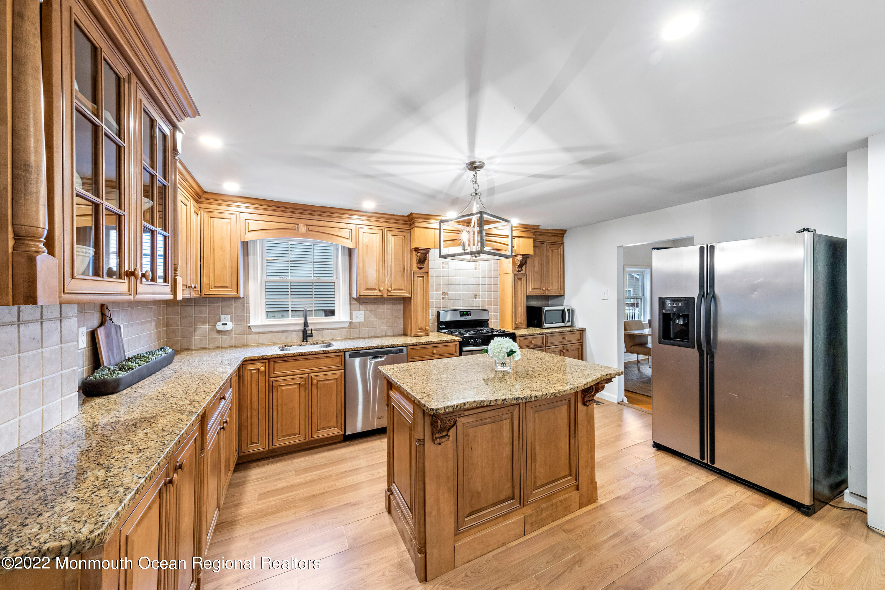 29 Church Street Rumson, NJ 07760 - Photo 17 of 42 a large kitchen with stainless steel appliances granite countertop a sink stove and refrigerator