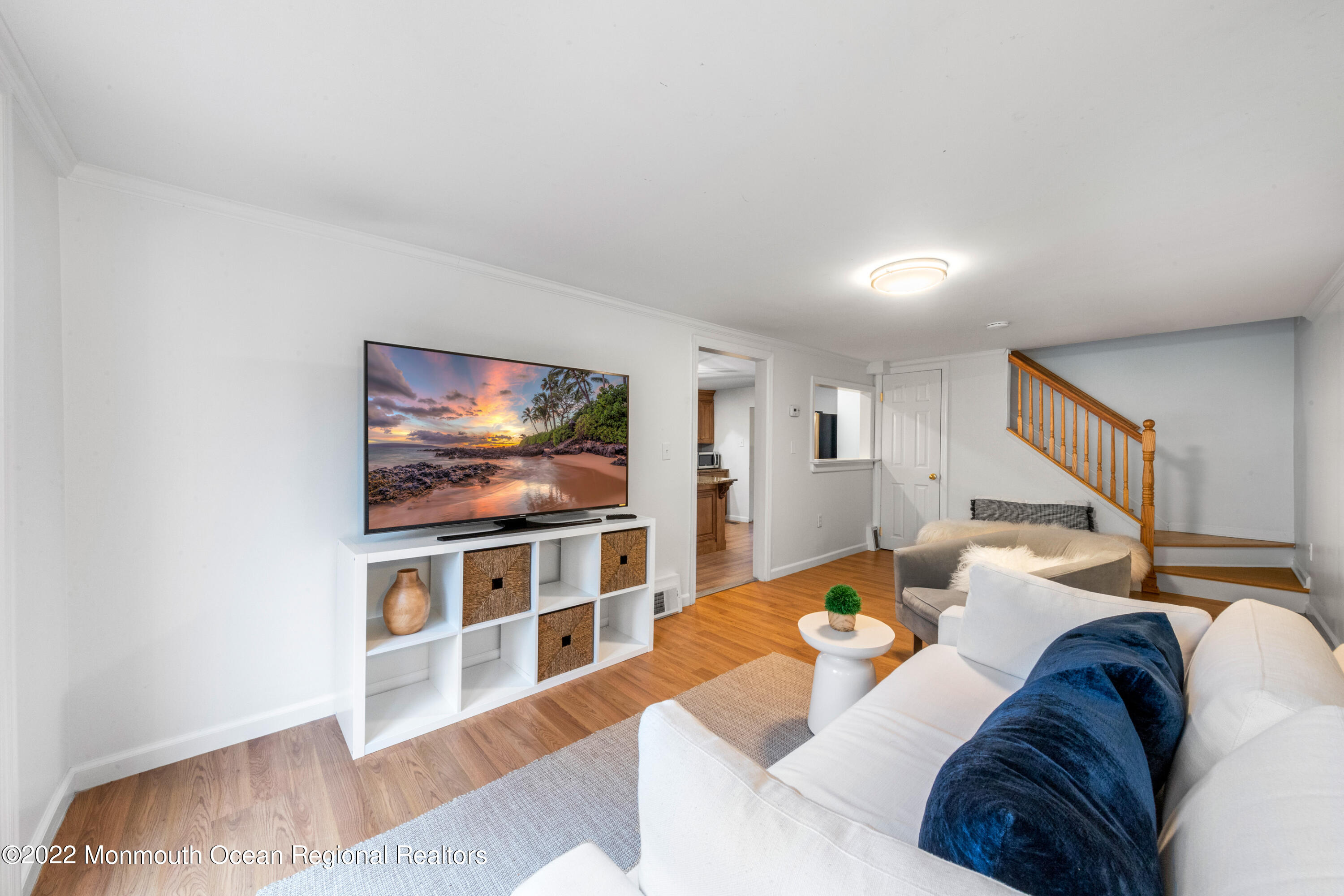 29 Church Street Rumson, NJ 07760 - Photo 25 of 42 a living room with furniture and a flat screen tv