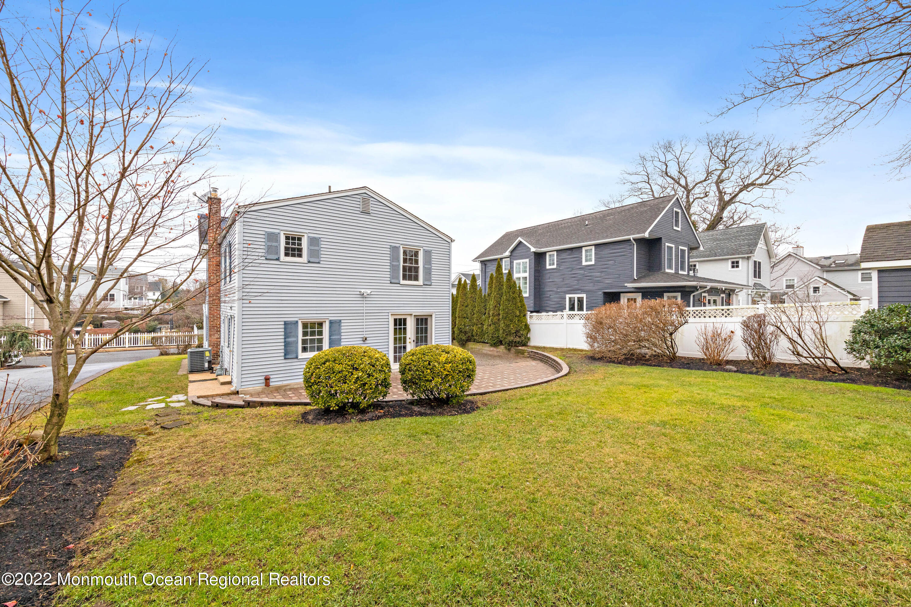 29 Church Street Rumson, NJ 07760 - Photo 40 of 42 a front view of a house with a yard