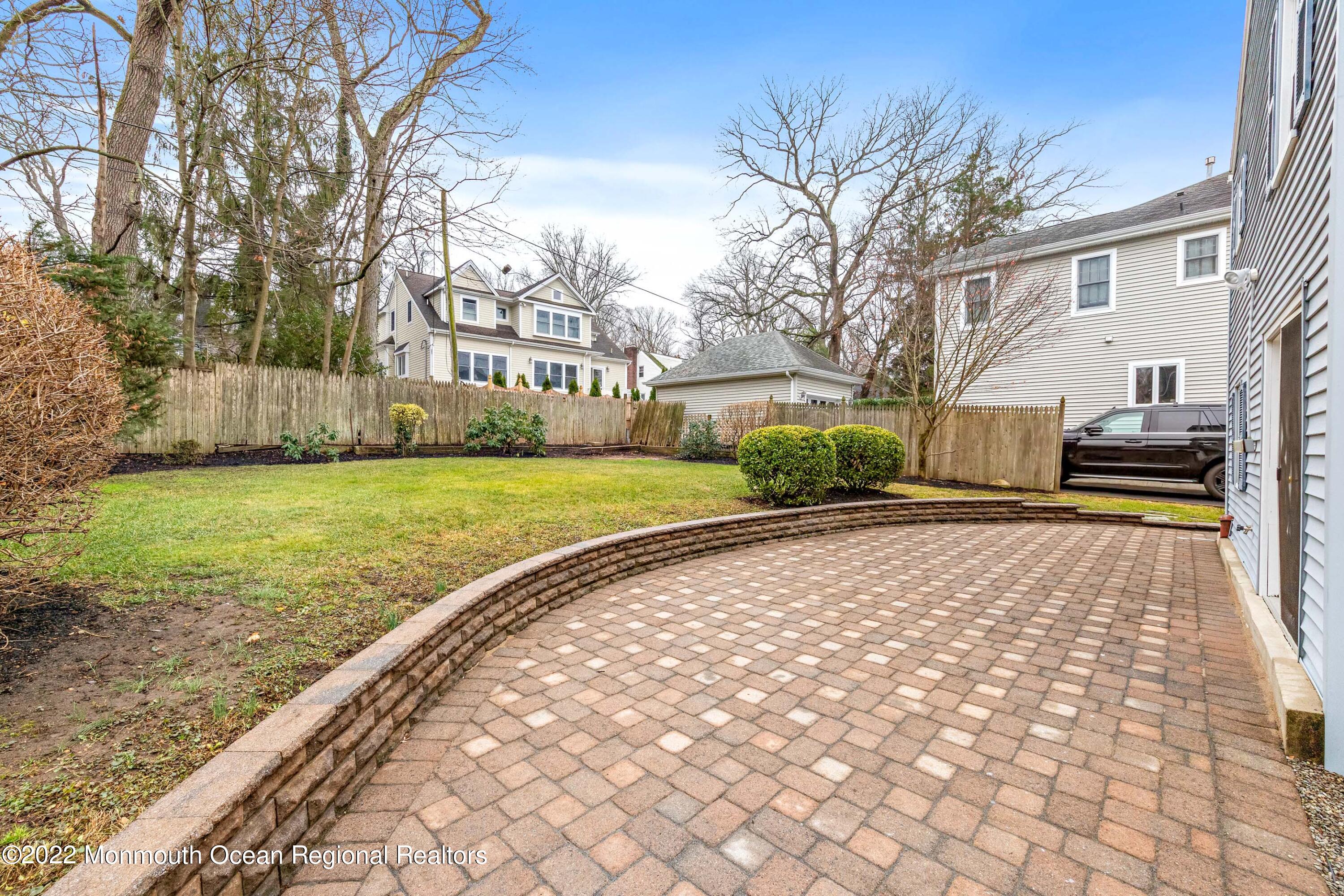 29 Church Street Rumson, NJ 07760 - Photo 42 of 42 a view of a backyard with a large tree