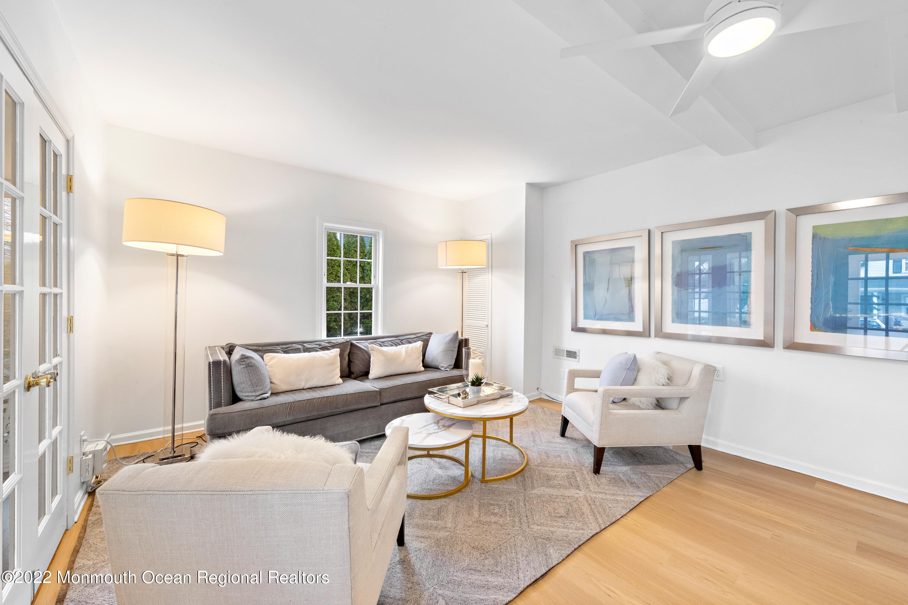29 Church Street Rumson, NJ 07760 - Photo 7 of 42 a living room with furniture and a large window