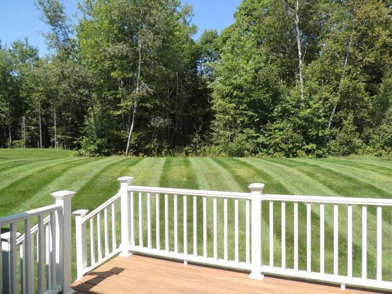 56 Highland Ridge Drive, Unit 14 Hampden, ME 04444 - Photo 22 of 34 Back Yard.