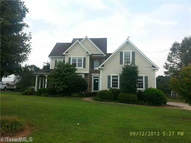 2714 Colton Drive Oak Ridge, NC 27310 - Photo 1 of 8 Exterior Front.