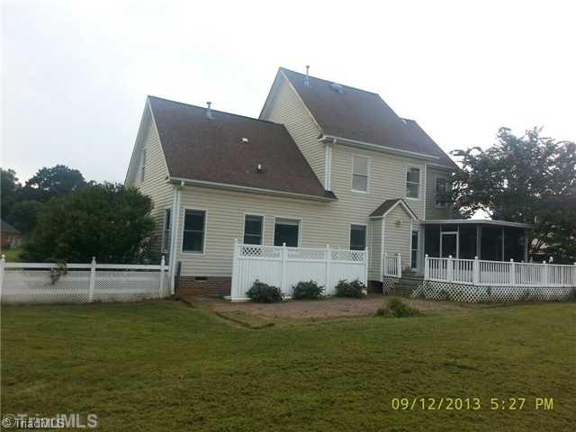 2714 Colton Drive Oak Ridge, NC 27310 - Photo 2 of 8 Exterior Back.