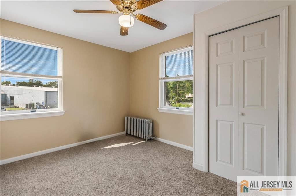 114 Runyon Avenue Middlesex, NJ 08846 - Photo 17 of 34 a view of an empty room and window