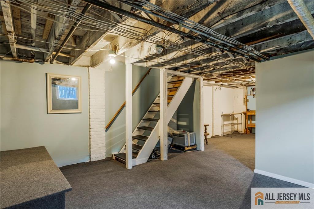 114 Runyon Avenue Middlesex, NJ 08846 - Photo 22 of 34 a view of an empty room with stairs