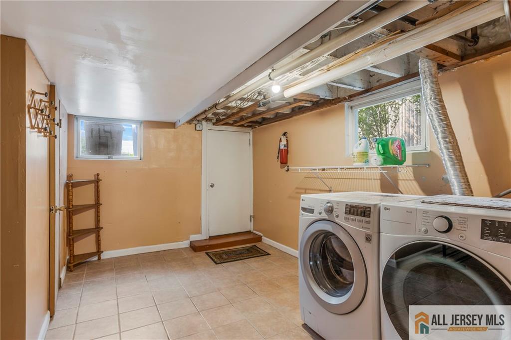 114 Runyon Avenue Middlesex, NJ 08846 - Photo 27 of 34 a view of a storage & utility room with washer and dryer
