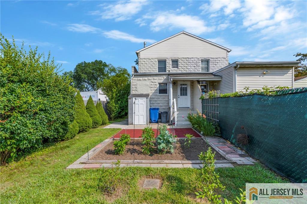 114 Runyon Avenue Middlesex, NJ 08846 - Photo 30 of 34 a front view of a house with a yard