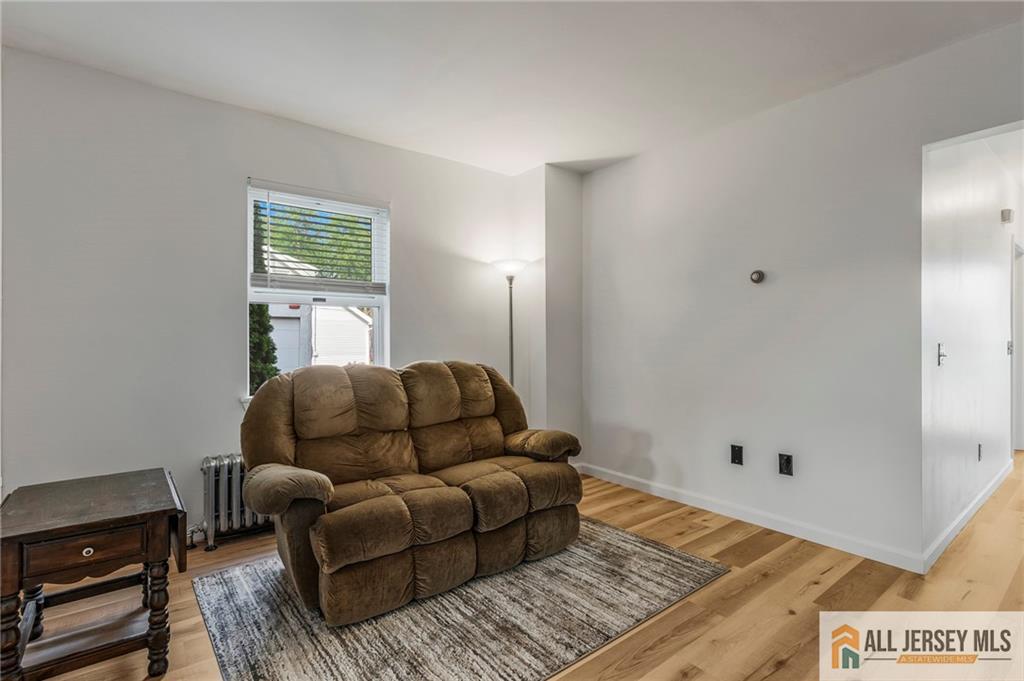 114 Runyon Avenue Middlesex, NJ 08846 - Photo 7 of 34 a bedroom with furniture and a window