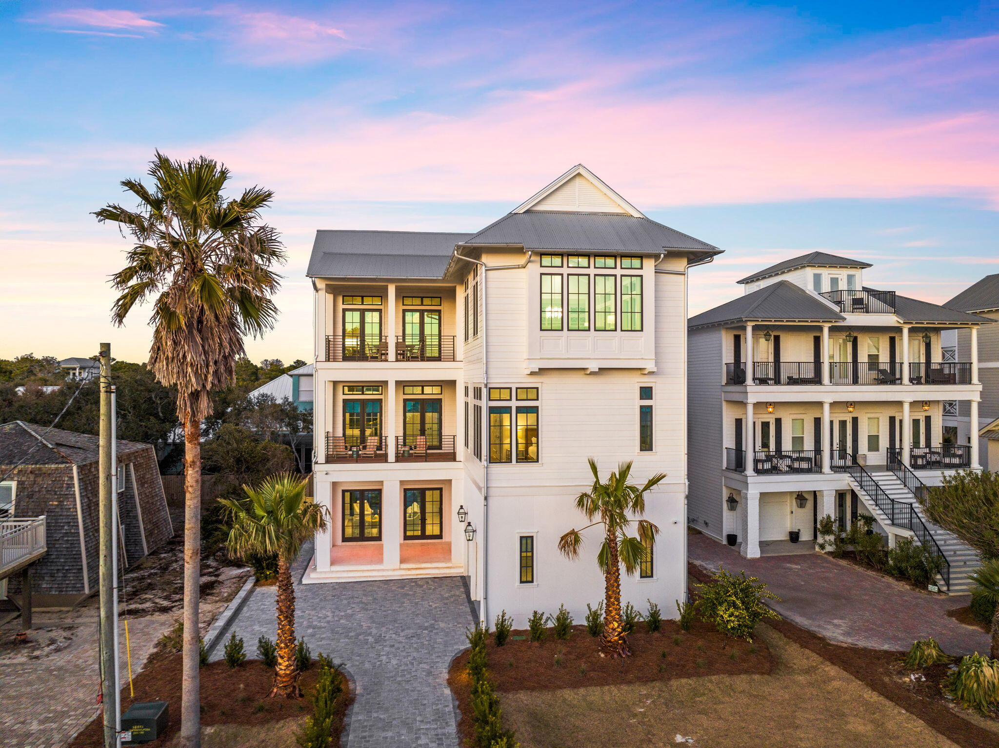 8103 East County Highway 30A Inlet Beach, FL 32461 - Photo 2 of 86 a front view of a house with a yard