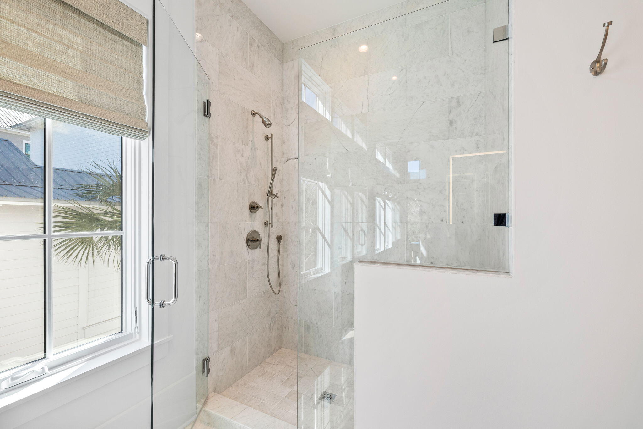 8103 East County Highway 30A Inlet Beach, FL 32461 - Photo 52 of 86 a bathroom with a glass shower door
