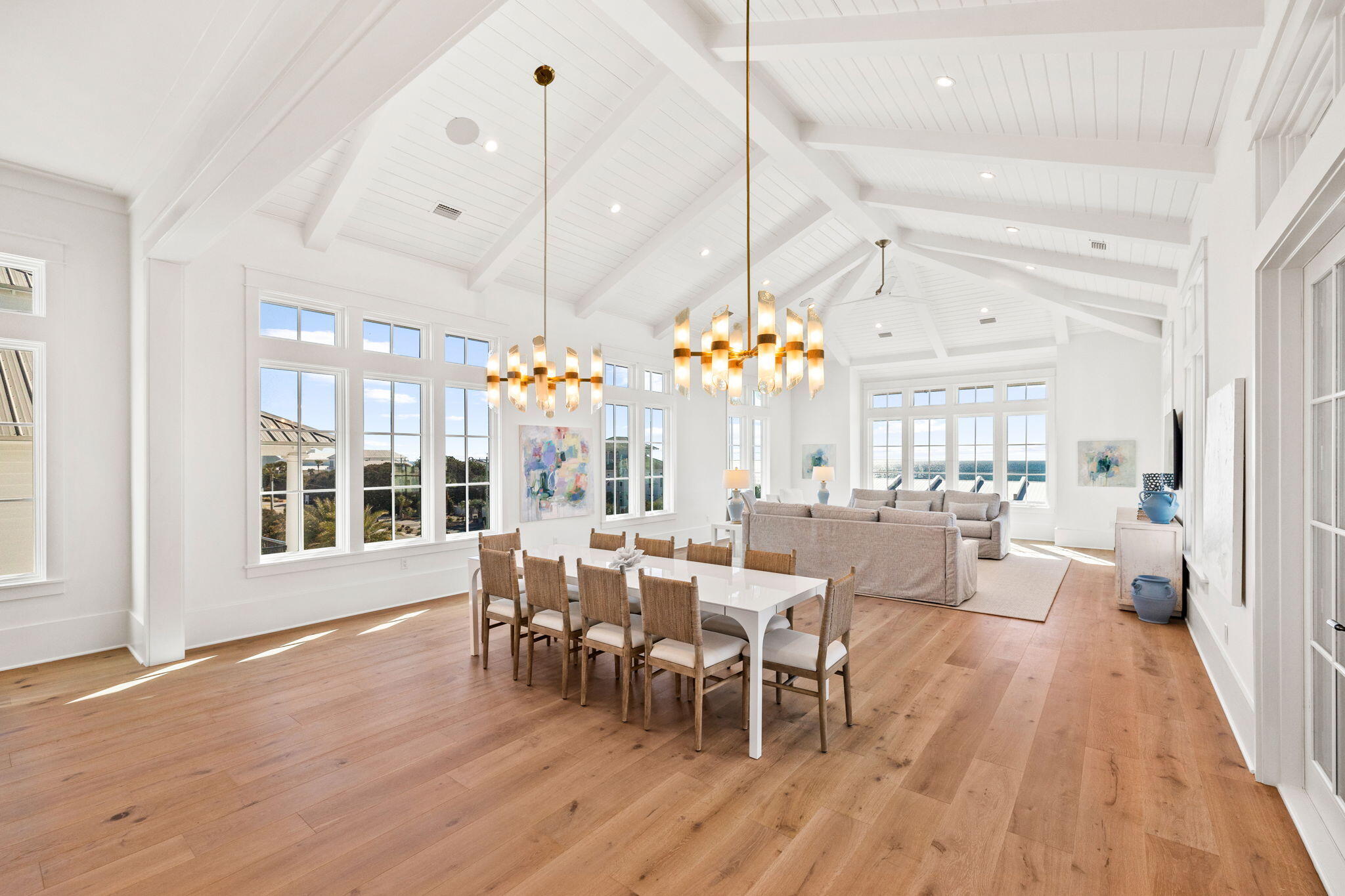 8103 East County Highway 30A Inlet Beach, FL 32461 - Photo 68 of 86 a view of a dining room with furniture wooden floor and chandelier