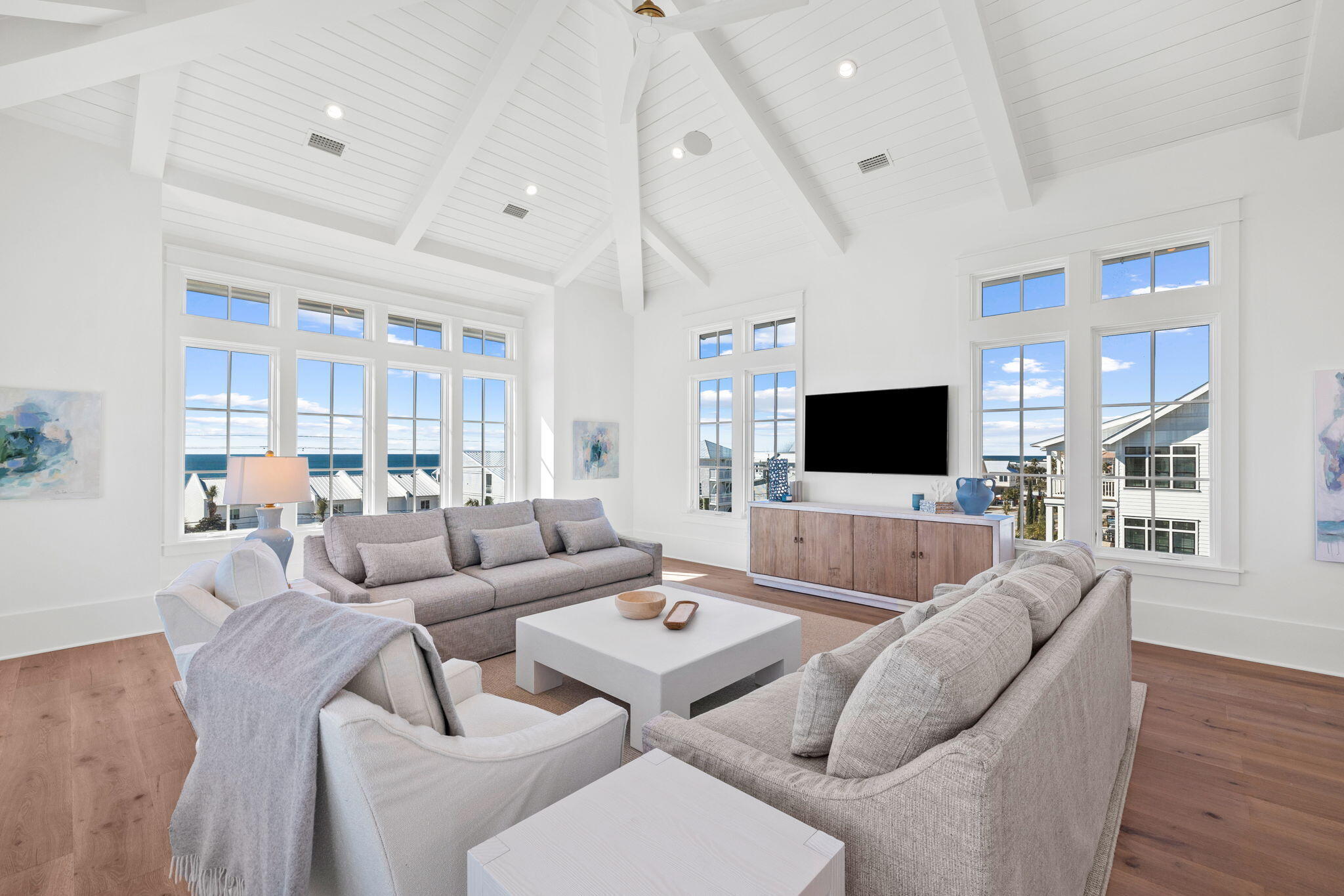 8103 East County Highway 30A Inlet Beach, FL 32461 - Photo 76 of 86 a living room with furniture and a flat screen tv