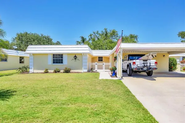 a front view of a house with a patio