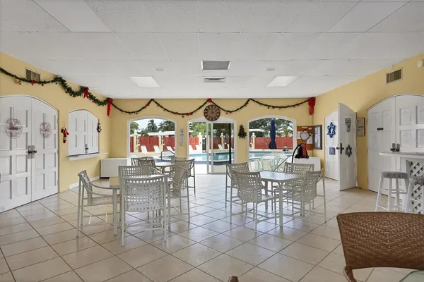 a view of a dining room with furniture