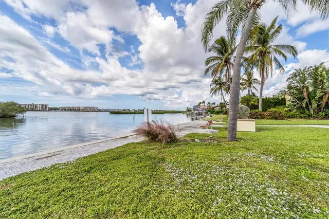 a view of a lake with a big yard