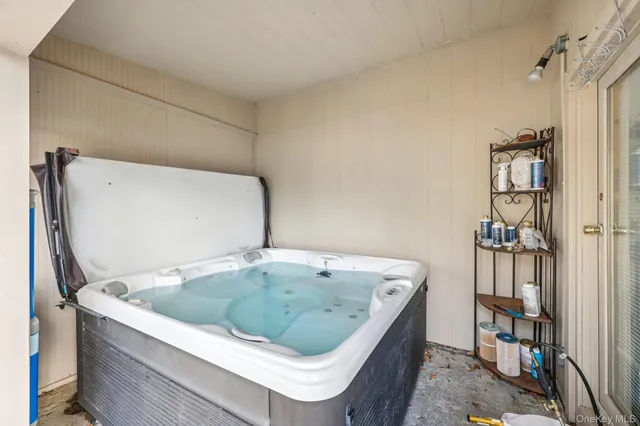 a bath tub sitting in a bathroom