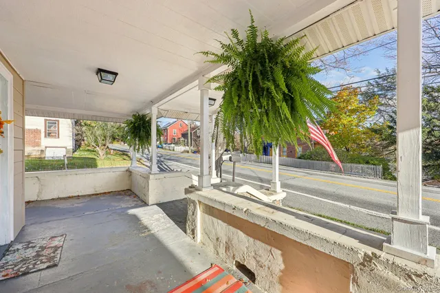 a view of a living room and entryway