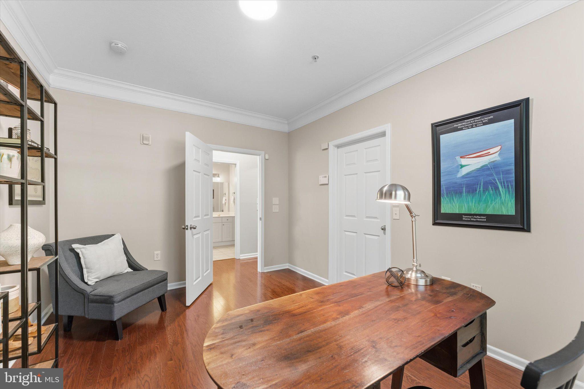 503 Sunset View Terrace Southeast, Unit 101 Leesburg, VA 20175 - Photo 23 of 39 Inviting workspace with serene decor.