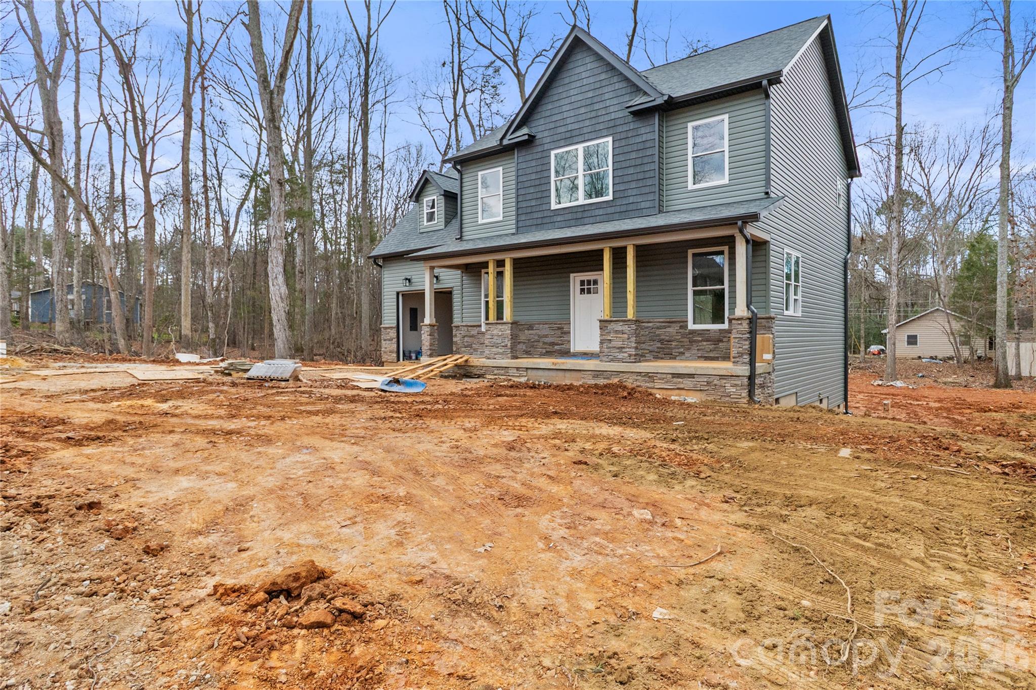 3692 Shannon Loop Denver, NC 28037 - Photo 3 of 47 a front view of a house with a yard
