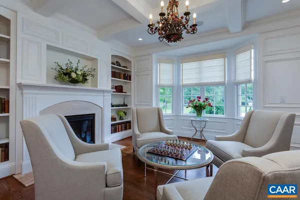 a kitchen with kitchen island granite countertop a sink stainless steel appliances and cabinets