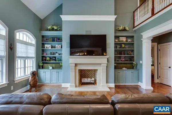 a kitchen with stainless steel appliances granite countertop cabinets and wooden floor