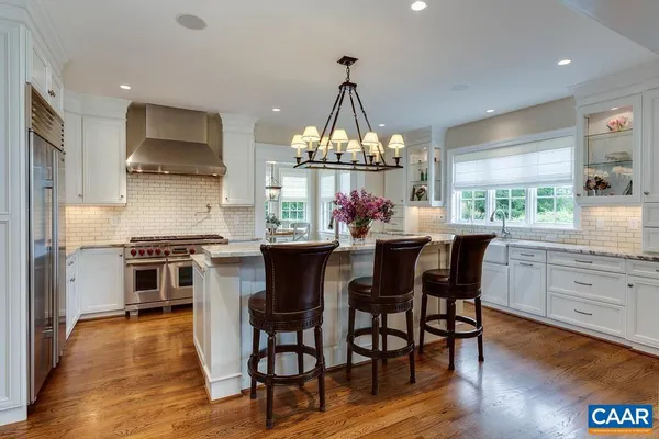 a dining room with furniture window wooden floor